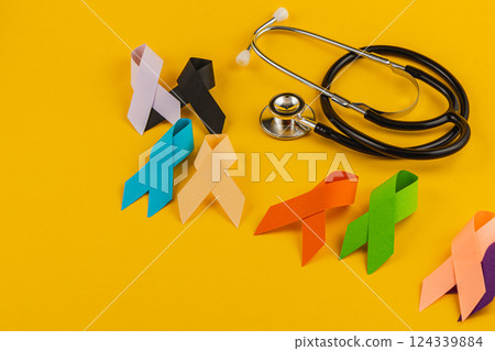 Colorful awareness ribbons and stethoscope symbolize health campaigns Colorful awareness ribbons and stethoscope symbolize health campaigns 124339884