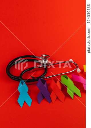 Ribbons and a stethoscope symbolize cancer prevention efforts Ribbons and a stethoscope symbolize cancer prevention efforts 124339888