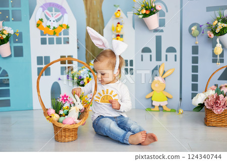 Baby girl celebrate Easter. Baby girl celebrate Easter. 124340744
