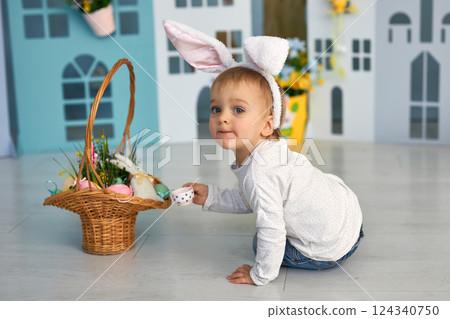 Baby girl celebrate Easter. Baby girl celebrate Easter. 124340750