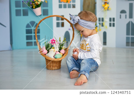 Baby girl celebrate Easter. Baby girl celebrate Easter. 124340751