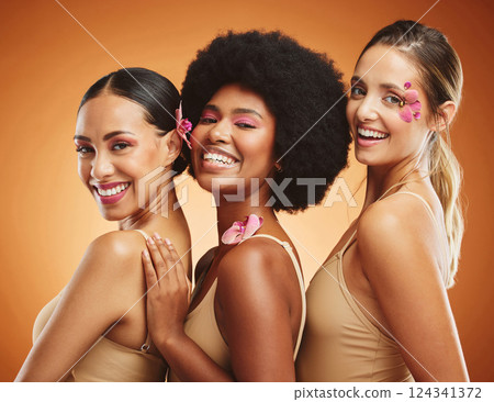Beauty, makeup and diversity with women and flowers petals on face for wellness, natural and cosmetics. Skincare, luxury and model with girls for spa facial, spring and salon with plant product 124341372