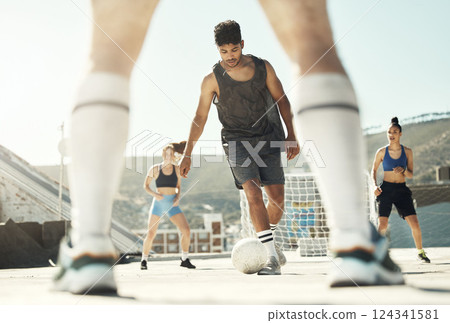 Ball, soccer and team of fitness people play a game, training and practice together in the city. Football, workout and sports people play, workout or exercise for health and wellness in urban town 124341581