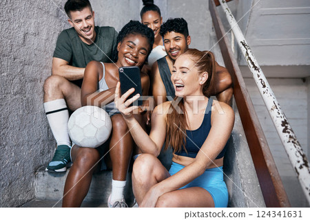 Selfie, smartphone and soccer people for sports social networking team, 5g international communication or connection on stairs. Diversity athlete football friends using phone for a social media post Selfie, smartphone and soccer people for sports social networking team, 5g international communication or connection on stairs. Diversity athlete football friends using phone for a social media post 124341631