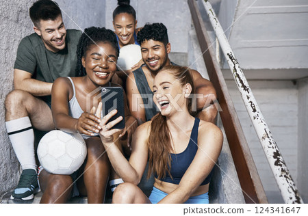 Soccer team, diversity or people on phone selfie, funny social media meme or internet joke after training, workout or exercise. Smile, happy and laughing sports friends or football players on mobile Soccer team, diversity or people on phone selfie, funny social media meme or internet joke after training, workout or exercise. Smile, happy and laughing sports friends or football players on mobile 124341647