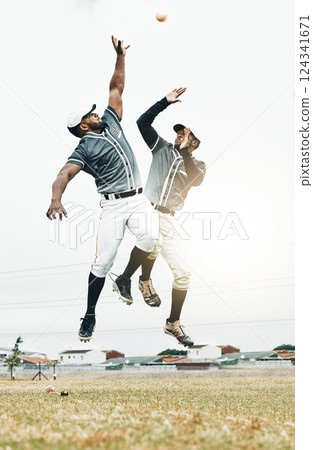 Baseball player, jump and catch baseball in game, contest or sport on field for sunshine. Team, teamwork and hands for ball in air at stadium, arena or pitch for sports, fitness and win outdoor Baseball player, jump and catch baseball in game, contest or sport on field for sunshine. Team, teamwork and hands for ball in air at stadium, arena or pitch for sports, fitness and win outdoor 124341671