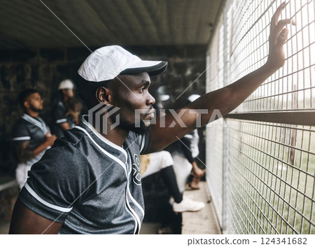 Black man, athlete and baseball, fitness and game, professional sport and exercise at sports pitch. African American, strong and team uniform, serious and focus while prepare for match. Black man, athlete and baseball, fitness and game, professional sport and exercise at sports pitch. African American, strong and team uniform, serious and focus while prepare for match. 124341682