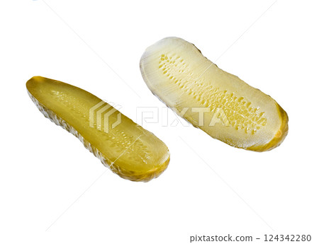 a pickled cucumber cut in half isolated on a white background. 124342280