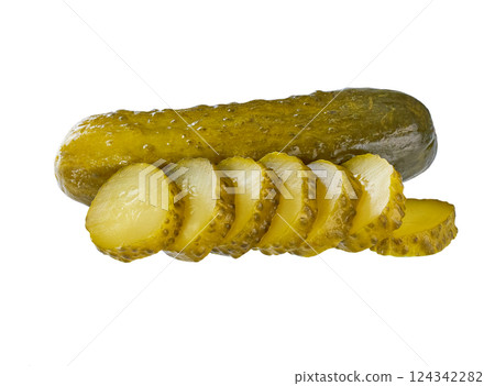 whole and chopped pickled cucumbers isolated on a white background. whole and chopped pickled cucumbers isolated on a white background. 124342282