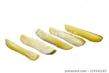 pickled cucumbers cut into sticks isolated on a white background. 124342283