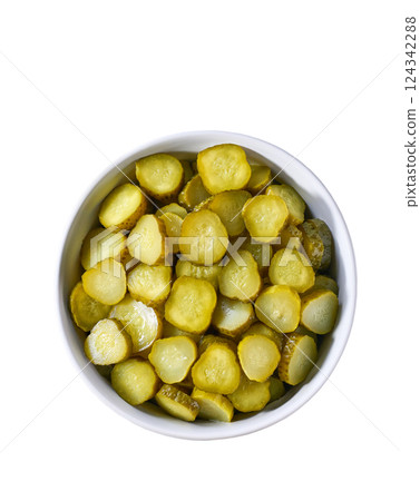 chopped pickled cucumbers in a white bowl isolated on a white background, top view. chopped pickled cucumbers in a white bowl isolated on a white background, top view. 124342288