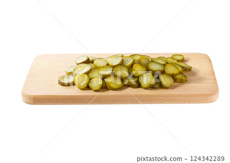 chopped pickled cucumbers on a cutting board  isolated on a white background. 124342289