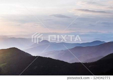 Layers of blue mountains stretching into the horizon 124342771