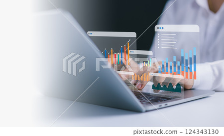 KPIs to improve organizational performance, Business analytics with charts, Businesswoman use computers to analyze business and manage corporate data in office, Financial and marketing strategy. 124343130