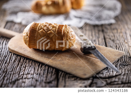 Oscypki - Traditional salty smoked cheese made from sheep's milk from the Polish region of Zakopane under the High Tatras 124343186