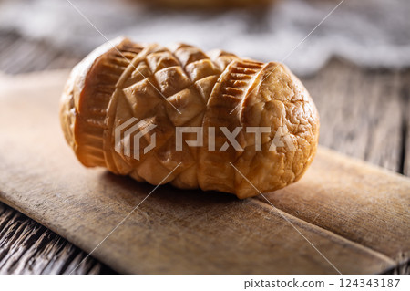 Oscypki - Traditional salty smoked cheese made from sheep's milk from the Polish region of Zakopane under the High Tatras 124343187