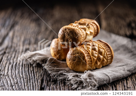 Oscypki - Traditional salty smoked cheese made from sheep's milk from the Polish region of Zakopane under the High Tatras 124343191