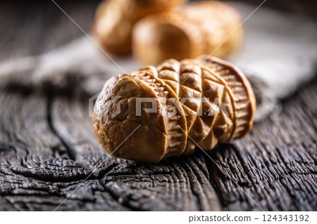 Oscypki - Traditional salty smoked cheese made from sheep's milk from the Polish region of Zakopane under the High Tatras 124343192