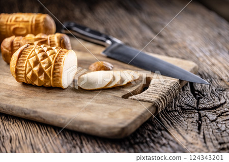 Oscypki - Traditional salty smoked cheese made from sheep's milk from the Polish region of Zakopane under the High Tatras 124343201