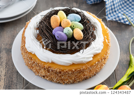 Homemade Easter egg cake on wooden table 124343487