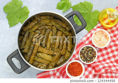 Stuffed collard greens with boiled leaves, traditonal turkish black sea region food, sarma, dolma Stuffed collard greens with boiled leaves, traditonal turkish black sea region food, sarma, dolma 124344498