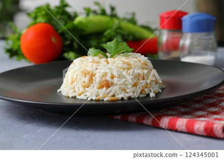 Traditional Turkish Rice Pilav. Plain Pilaf Portion Served. Organic Food. Turkish style rice pilaf Traditional Turkish Rice Pilav. Plain Pilaf Portion Served. Organic Food. Turkish style rice pilaf 124345001