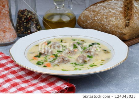 Meatball soup with carrot and potatoes named eksili terbiyeli sulu kofte or eksili kofte Meatball soup with carrot and potatoes named eksili terbiyeli sulu kofte or eksili kofte 124345025