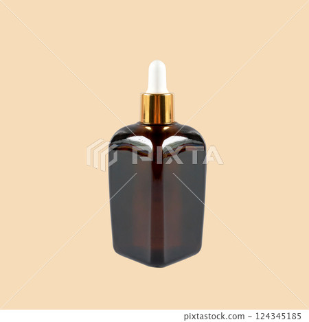 Brown Cosmetic Bottle on a white background. Brown Cosmetic Bottle on a white background. 124345185