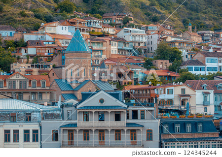 Traditional carved balconies and colorful wooden houses in the Old Town of Tbilisi Traditional carved balconies and colorful wooden houses in the Old Town of Tbilisi 124345244