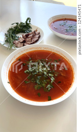 Close-up of Traditional Ukrainian Borscht with Parsley and Lard Close-up of Traditional Ukrainian Borscht with Parsley and Lard 124345471