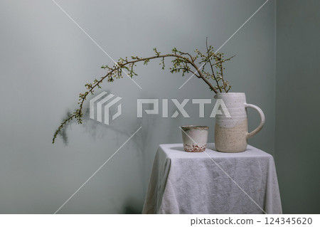 Minimalist Pottery Still Life With Branch 124345620