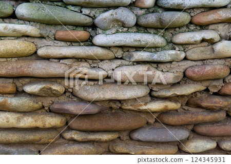 Beautiful Rustic Stacked Stone Wall Texture Background in Natural Colors for Design Projects Beautiful Rustic Stacked Stone Wall Texture Background in Natural Colors for Design Projects 124345931