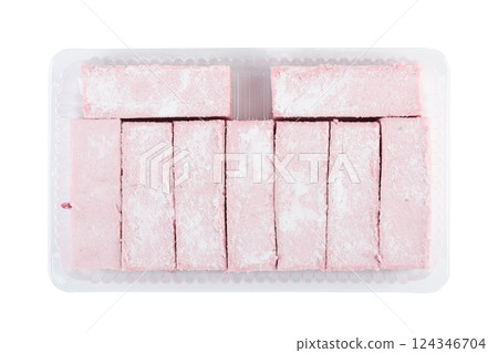 Top view of cranberry marshmallow sticks in plastic container on white background. Top view of cranberry marshmallow sticks in plastic container on white background. 124346704