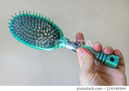 Holding Hair Brush Hand 124346944