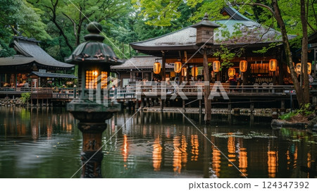 Tranquil Japanese Garden at Twilight Traditional Wooden Structure, Lanterns, and Reflective Pond Tranquil Japanese Garden at Twilight Traditional Wooden Structure, Lanterns, and Reflective Pond 124347392