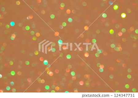 Colorful Bokeh Lights on an Orange Background in Abstract Design Colorful Bokeh Lights on an Orange Background in Abstract Design 124347731