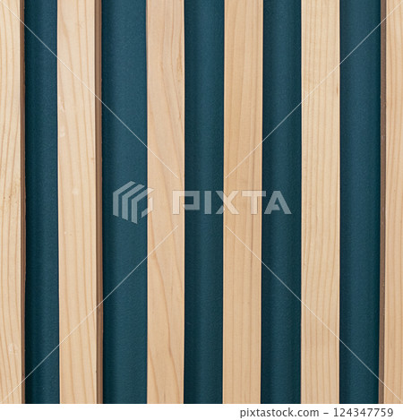 Decorative wooden slats with teal background forming a stylish modern interior design Decorative wooden slats with teal background forming a stylish modern interior design 124347759
