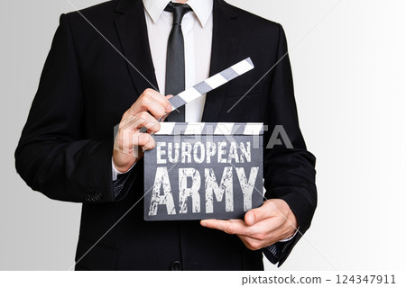 European Army. Businessman showing movie clapper 124347911