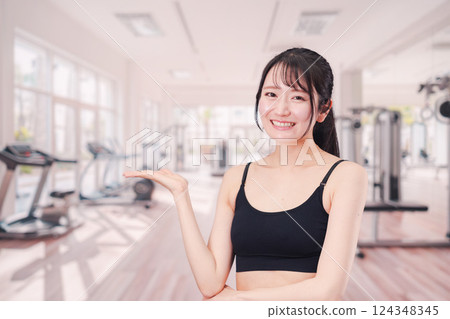 Young woman running in the gym 124348345