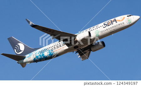 Shandong Airlines Boeing 737-800 takeoff climb Shandong Airlines Boeing 737-800 takeoff climb 124349197