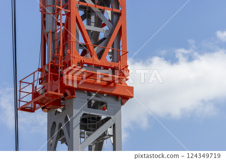 Close-up of the mast of a climbing crane. Image of a construction site 124349719