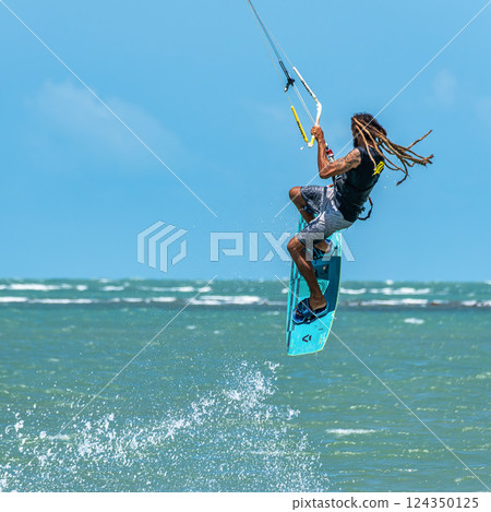 Kite surfing at Barra Grande beach on the coast of Piaui, northe Kite surfing at Barra Grande beach on the coast of Piaui, northe 124350125