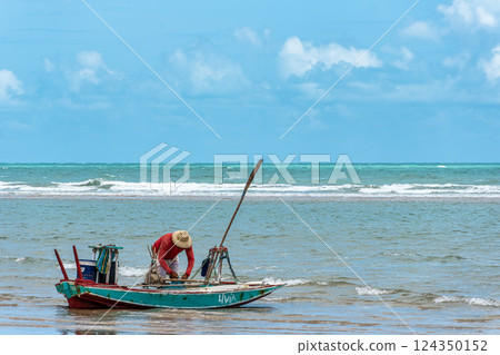 Fishermen at Canoa Quebrada Beach at Aracati in Ceara, Brazil. B Fishermen at Canoa Quebrada Beach at Aracati in Ceara, Brazil. B 124350152