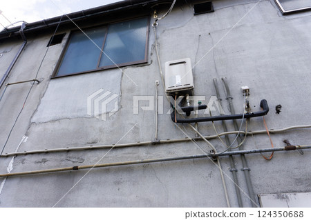 Plumbing in an old dilapidated building Plumbing in an old dilapidated building 124350688