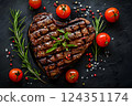 Savor the delectable heartshaped grilled steak with aromatic rosemary, cherry tomatoes, and seasoning on a dark background. Enjoy this gourmet dish filled with succulent flavors 124351174