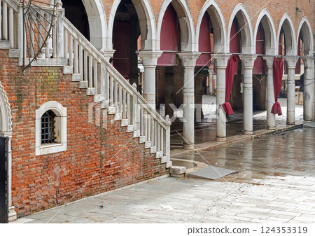 Wet floor in Venice street 124353319