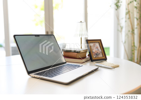 Laptop on white table and interior Laptop on white table and interior 124353832