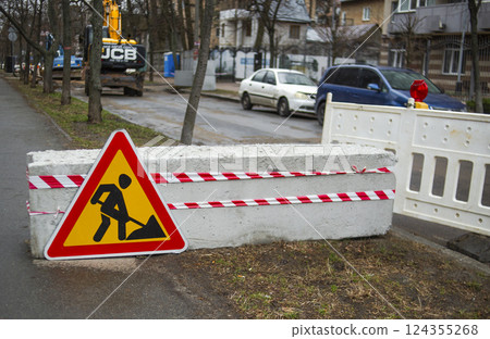 construction work sign on the street 124355268