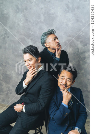 A group of middle-aged male business people who are confident in their skin A group of middle-aged male business people who are confident in their skin 124355485