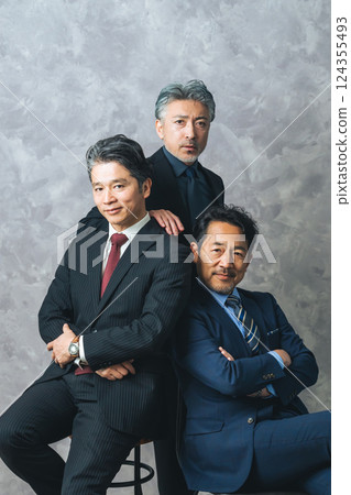 A group of cool middle-aged male business people A group of cool middle-aged male business people 124355493